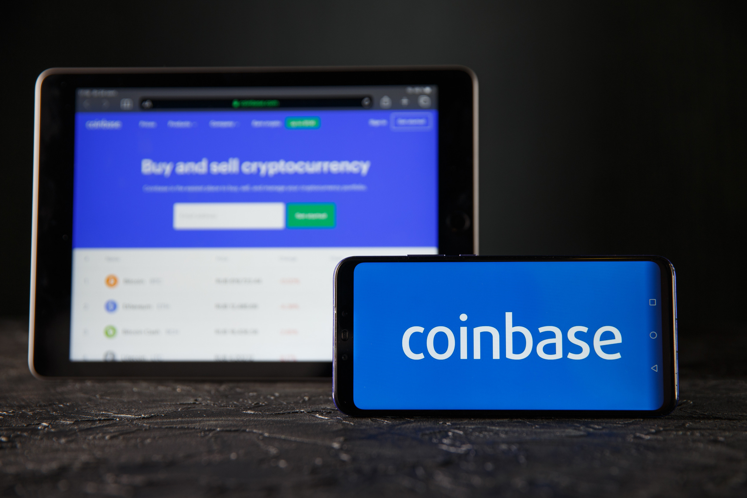 coinbase stock downgraded at atlantic equities